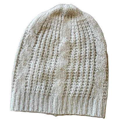 Suzy Blue Canada cable knit hat showcasing a cozy, stylish hat with a textured cable knit pattern and a snug fit.
