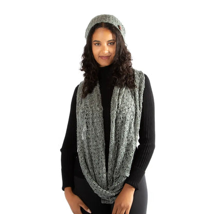 Grey popcorn knit hat with button detail from Suzie Blue Canada, cozy winter accessory for cold weather.