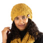 Mustard-colored knit hat with button detail from Suzie Blue Canada, cozy popcorn style hat for cold weather.