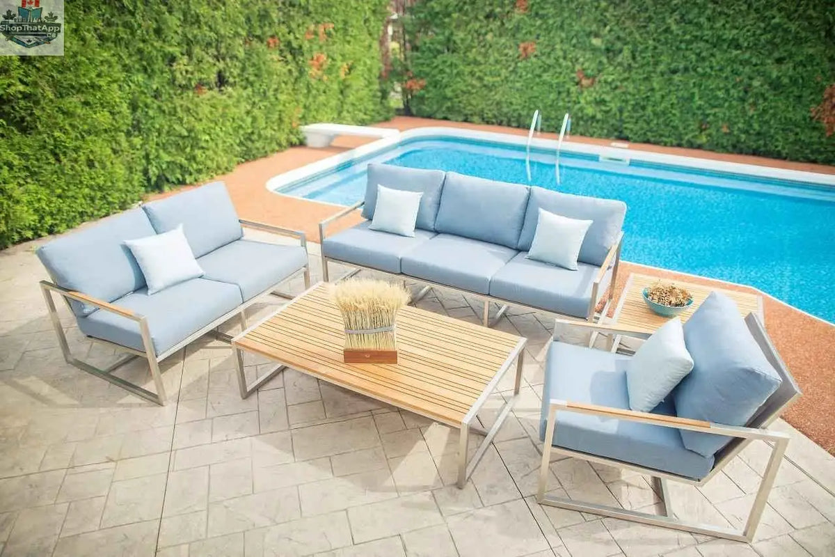 Krikacy Acacia outdoor club chair with plush cushions, stylish denim fabric, perfect for outdoor seating and relaxation.