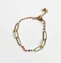 Gold plate chainlink bracelet with colorful enamel accents, crafted by Suzie Blue Canada, featuring a stylish and modern design.