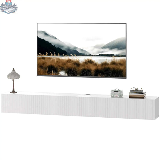 White Jesse floating TV stand with two fluted flip-down doors, suitable for TVs up to 75 inches, by SLOTH Nation.