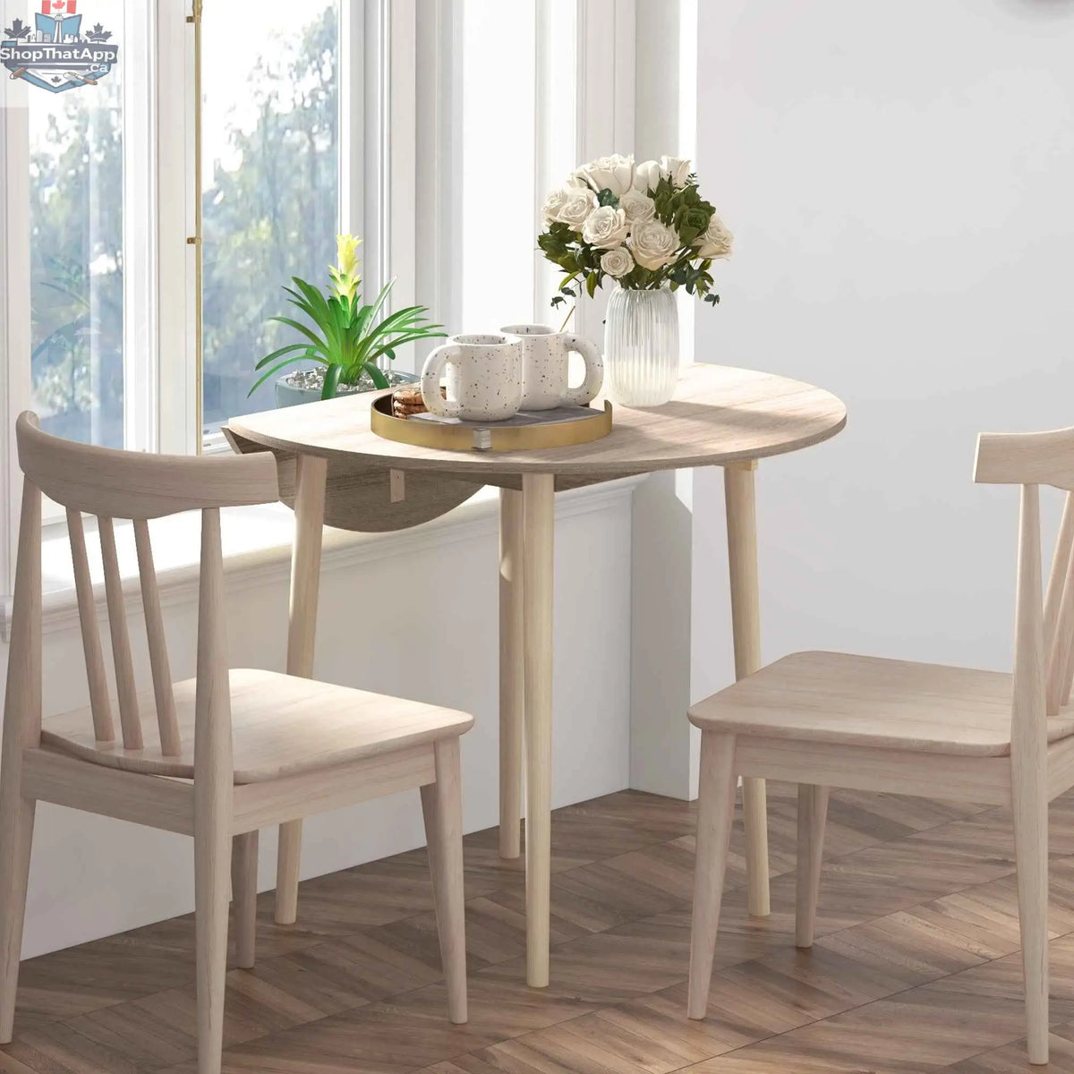 SLOTH Nation Merrill folding round dining table with drop-leaf in oak, compact design for small kitchen or dining space.
