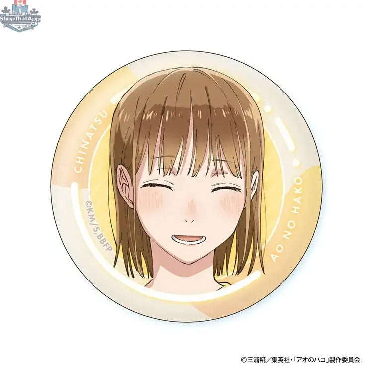 Blue box anime merch can badge featuring Chinatsu's face from Doki Doki Land, collectible anime character badge, blue background.