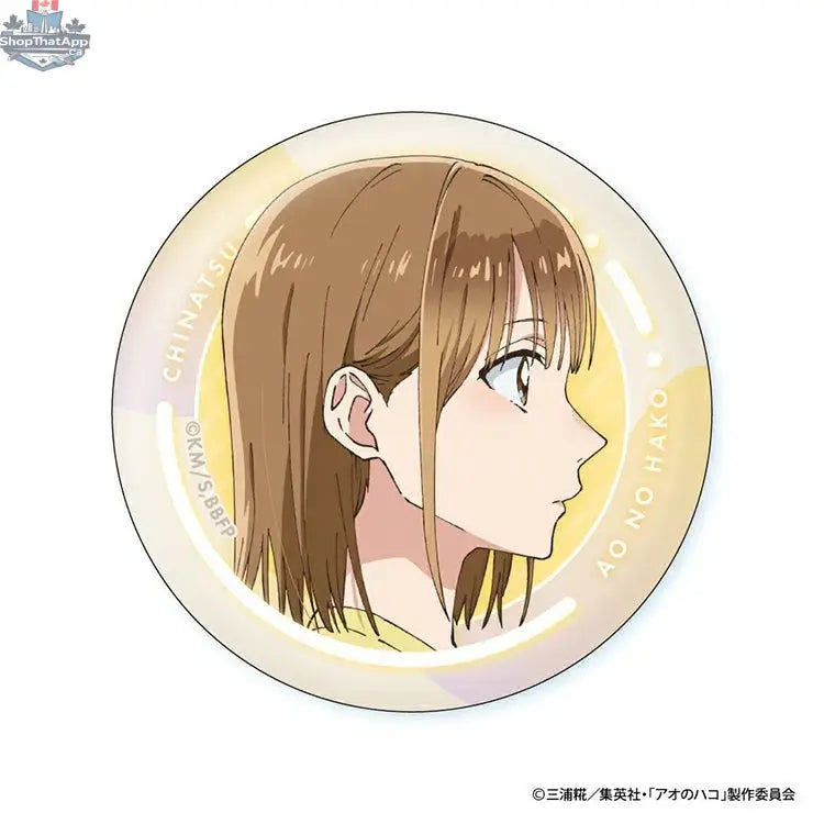 Blue box anime merch can badge featuring Chinatsu's face from Doki Doki Land, collectible anime character accessory.