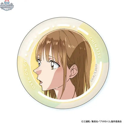 Blue box anime merch can badge featuring Chinatsu's face from Doki Doki Land, collectible anime character badge, close-up image.