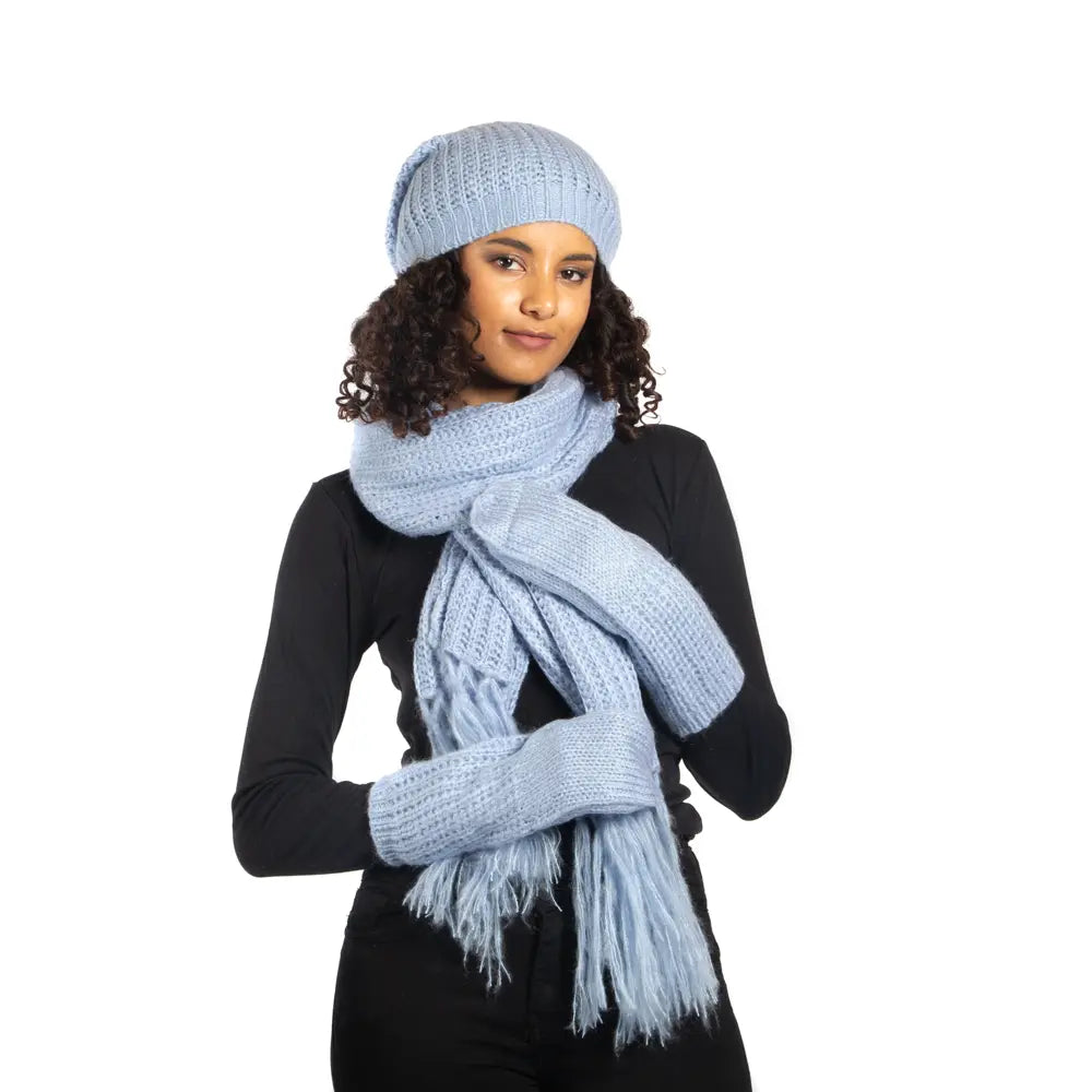 Blue knit hat with tie back from Suzie Blue Canada, featuring a simple design and cozy style for casual wear.