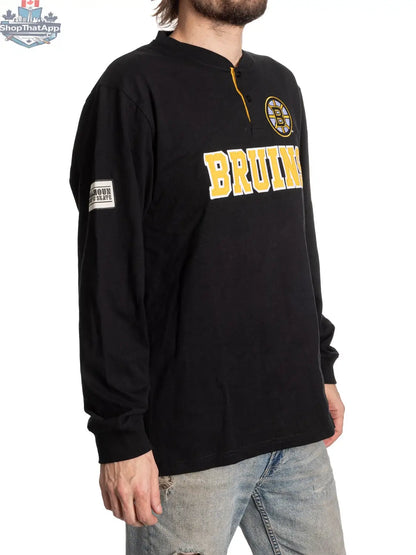 Calhoun Surf N' Skate Boston Bruins long sleeve henley shirt with team logo, featuring a comfortable fit and Bruins branding.