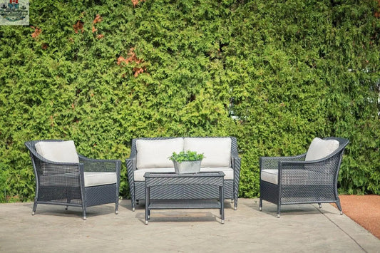 Enclover Camus outdoor conversational set with Sunbrella cushions, featuring four stylish, comfortable patio lounge pieces.