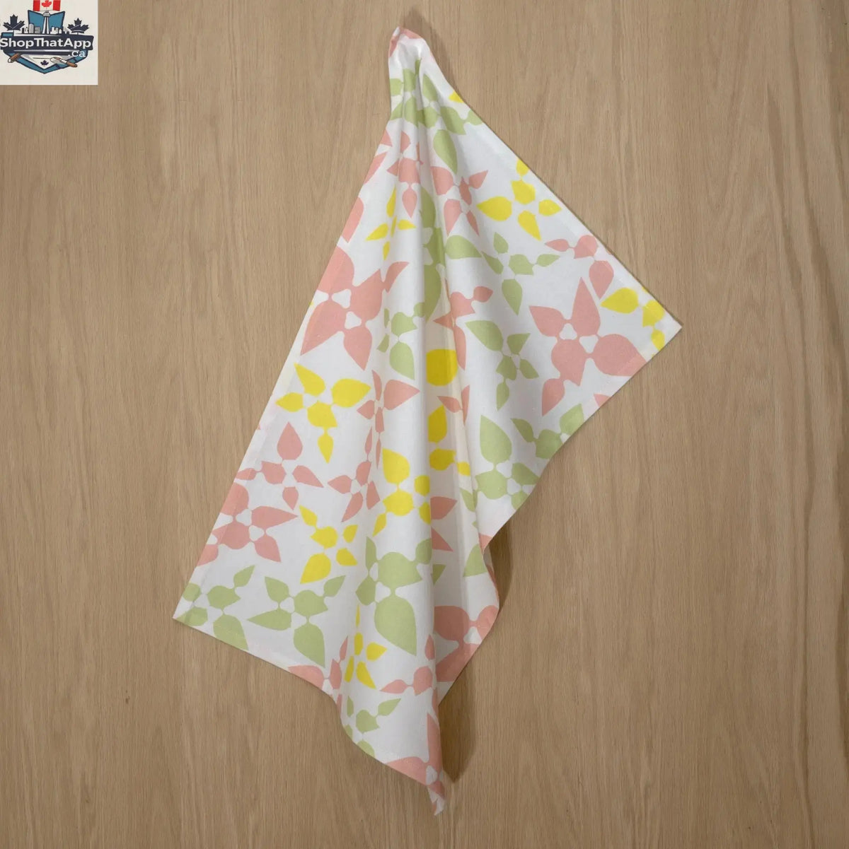 Yellow printed Celebration cotton tea towel by Hem and Tassel, featuring festive designs for various occasions.
