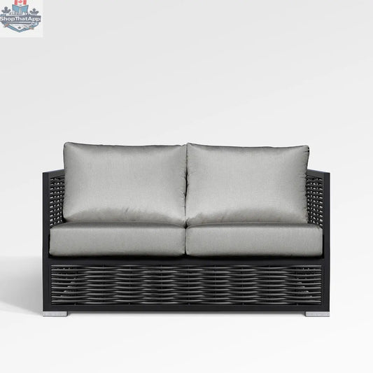Chestnut loveseat by Enclover with Sunbrella® cushions, featuring a cozy, cushioned seating area and stylish fabric upholstery.