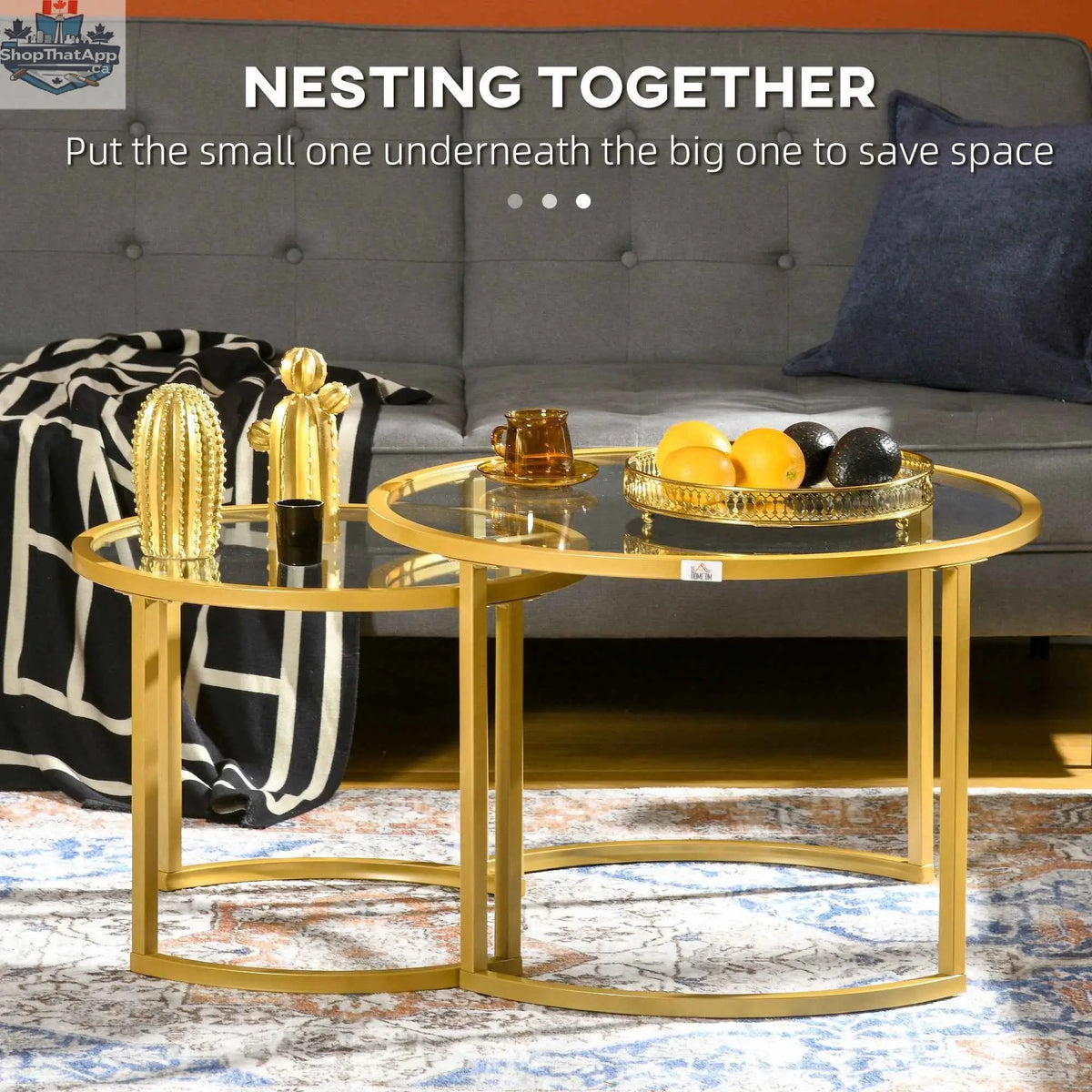 Set of two modern nesting coffee tables by SLOTH Nation with gold finish and tempered glass tops, sleek contemporary furniture.