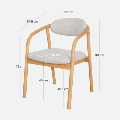 Hedda dining chair by Hygge Design House with natural ash wood legs and beige upholstered seat, modern and stylish.