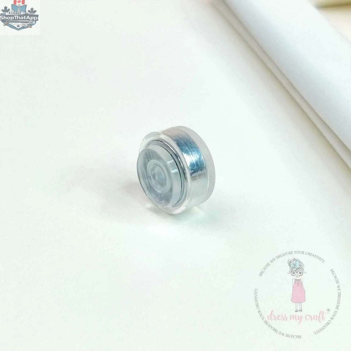 Transparent spinner embellishments by Dress My Craft for crafting projects, designed by Ecstasy Crafts.