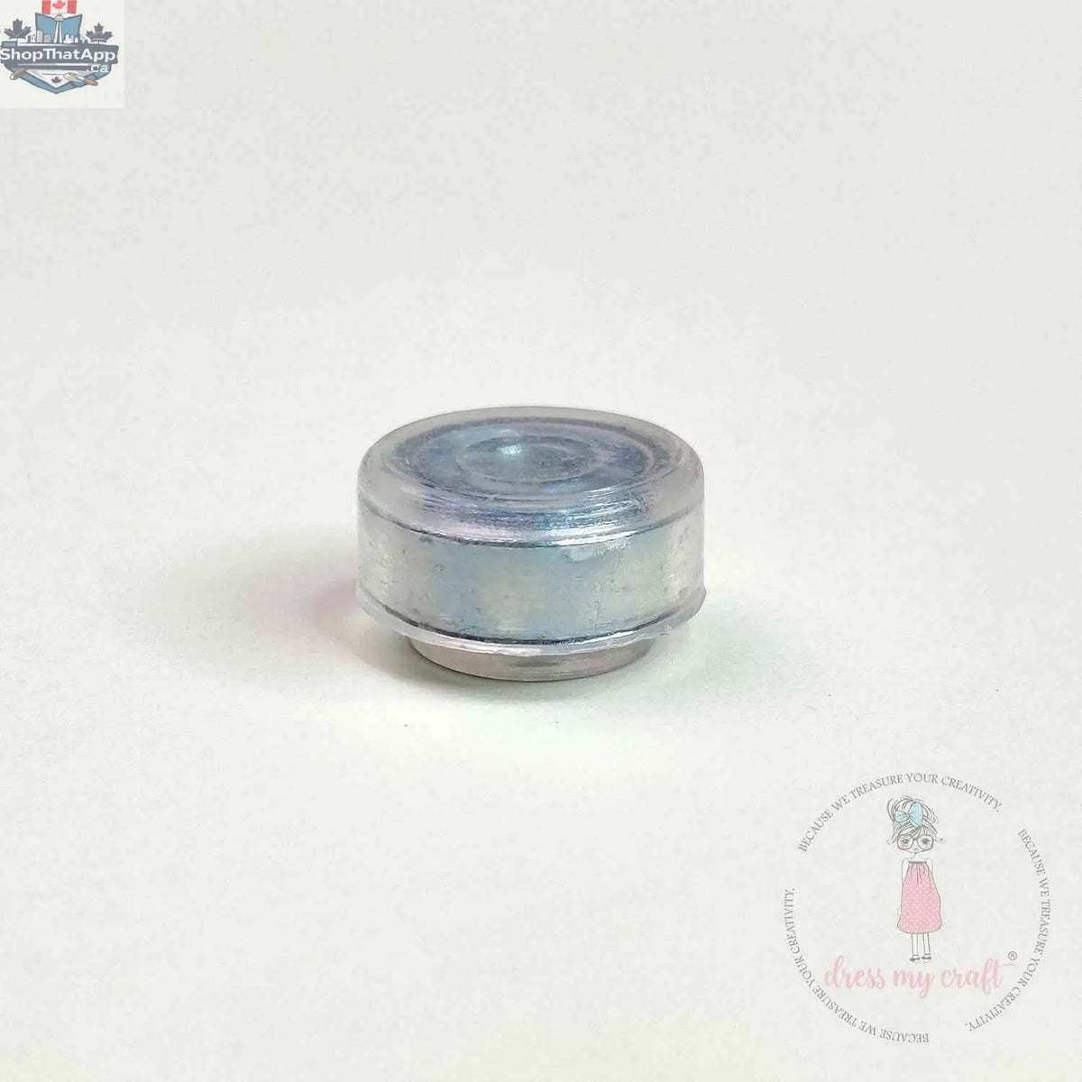 Transparent spinners embellishments by Dress My Craft for craft projects, featuring clear, shiny decorative accents from Ecstasy Crafts.