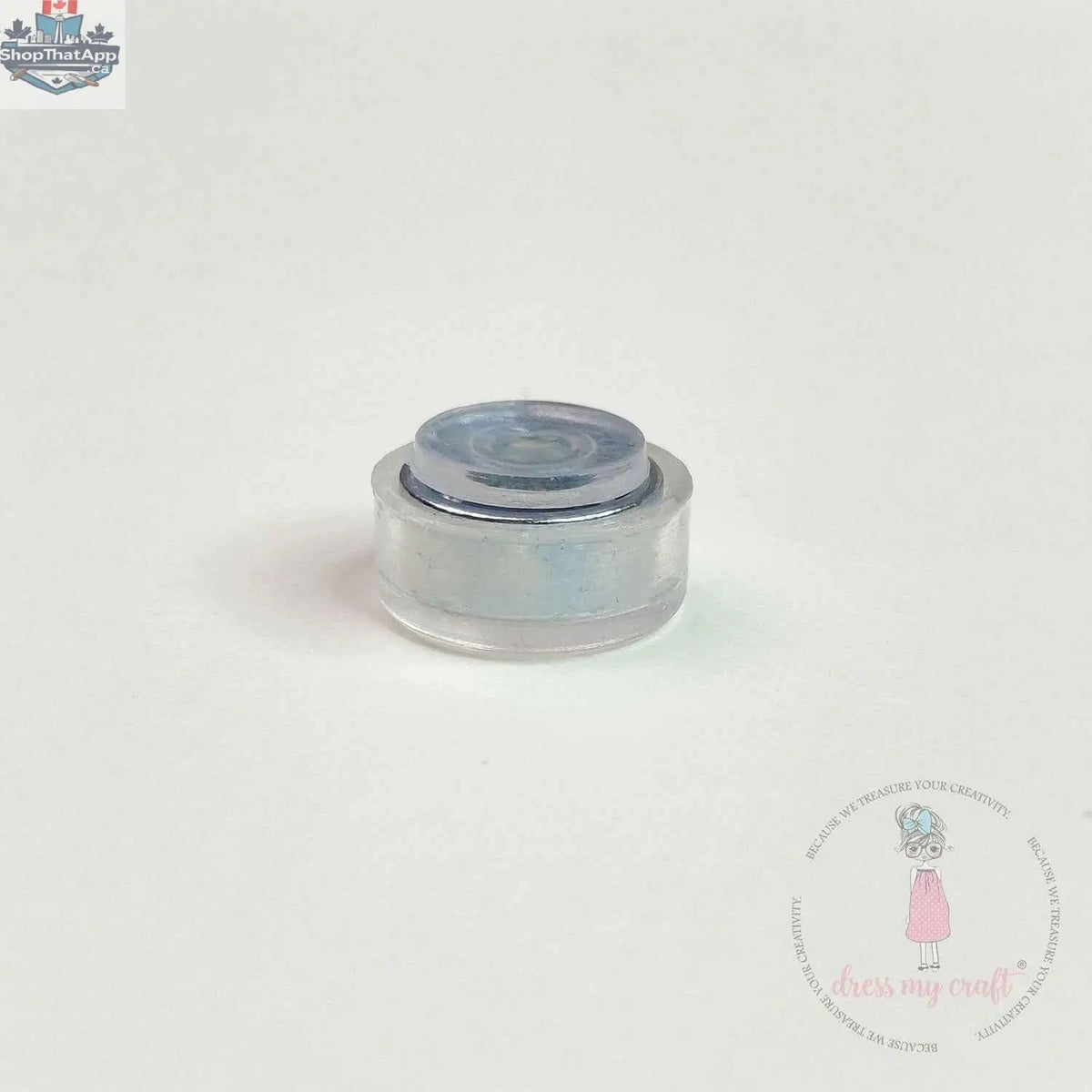 Transparent spinners embellishments from Dress My Craft by Ecstasy Crafts, showing colorful, clear plastic decorative spinner components.