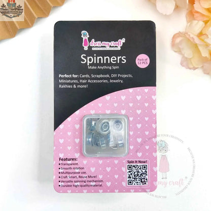 Transparent spinners embellishments from Dress My Craft by Ecstasy Crafts, shown as clear, round decorative craft embellishments.