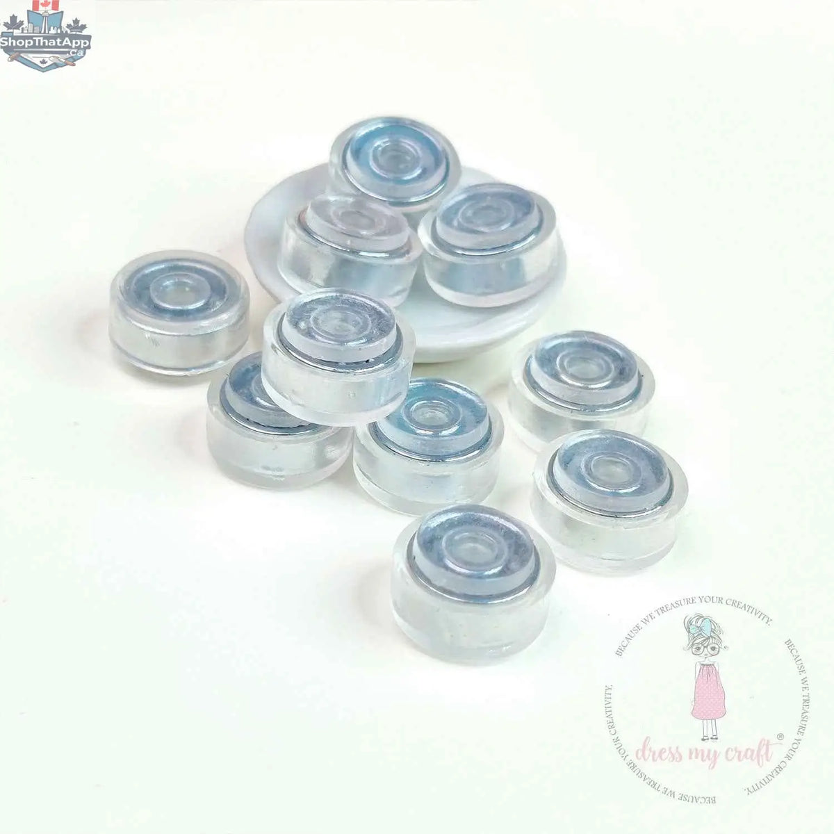 Transparent spinners embellishments by Dress My Craft, Ecstasy Crafts, featuring clear, decorative embellishments for craft projects.