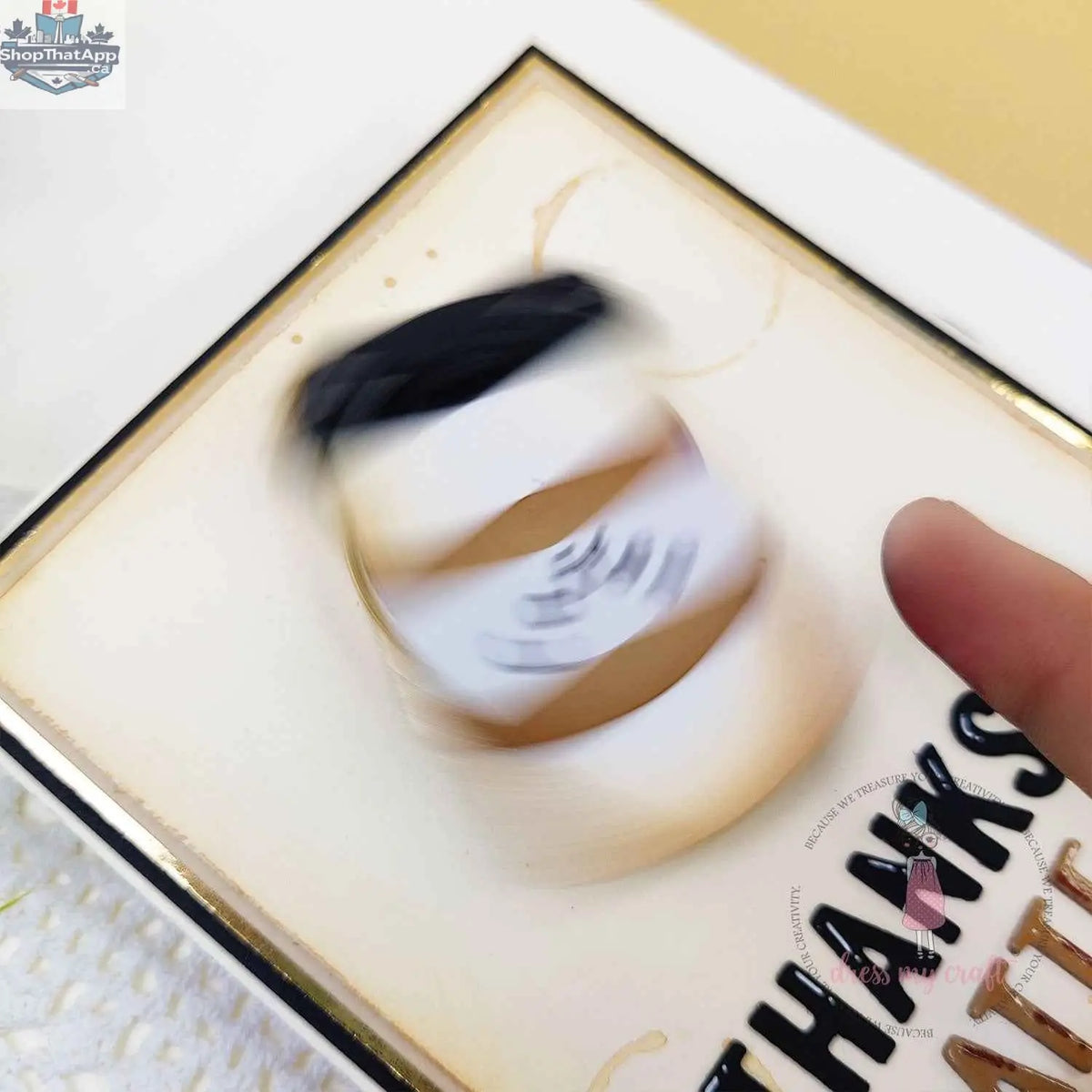 Transparent spinner embellishments by Dress My Craft, perfect for adding shimmer to paper crafts and DIY projects.