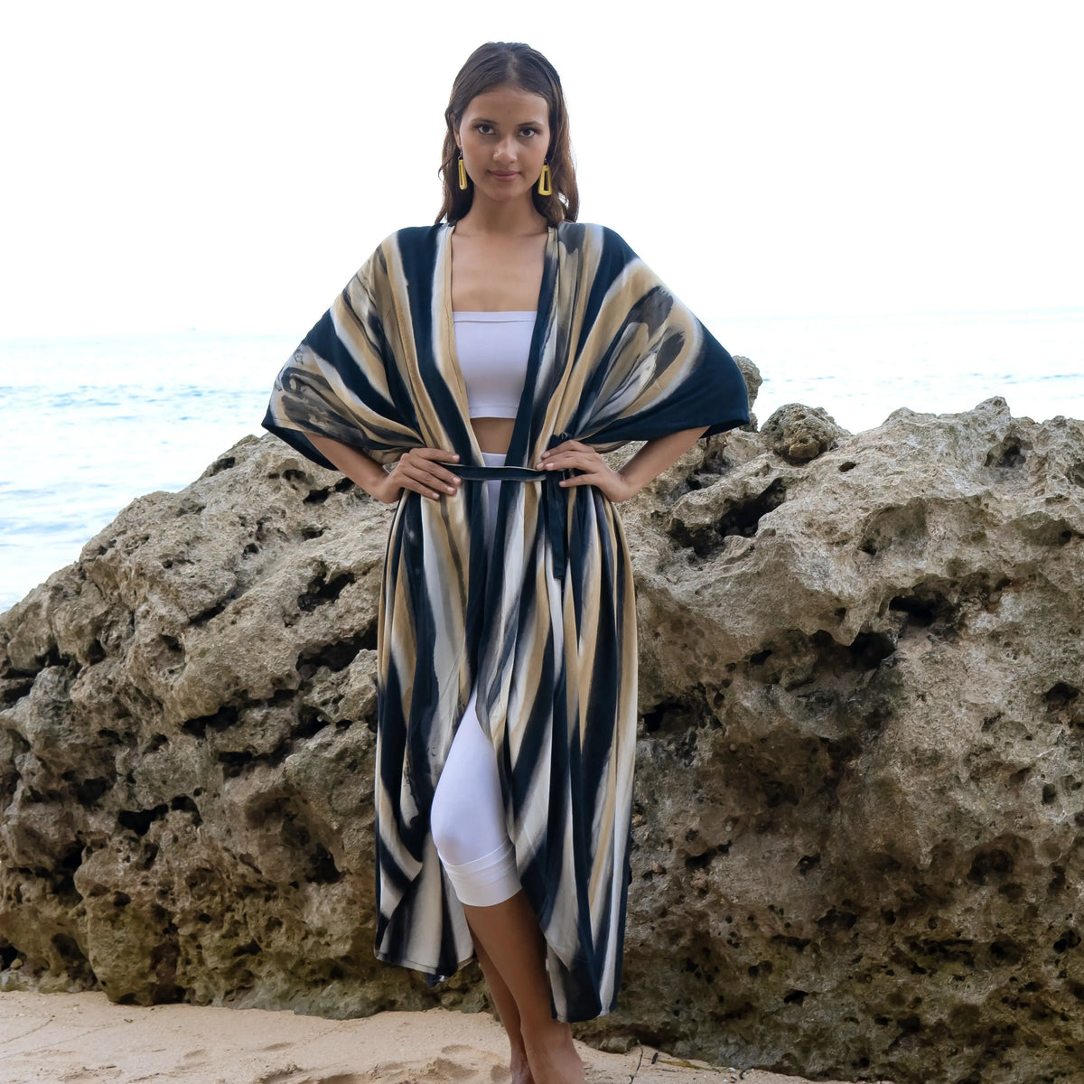 Gray and gold abstract tie-dye kimono by Suzie Blue Canada, featuring a stylish and versatile fashion piece with flowing fabric.