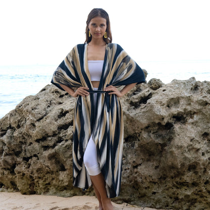 Gray and gold abstract tie-dye kimono by Suzie Blue Canada, featuring a stylish and versatile fashion piece with flowing fabric.