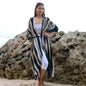 Suzie Blue Canada bold abstract tie-dye kimono in grey and gold, featuring a stylish, versatile fashion piece with flowing fabric.