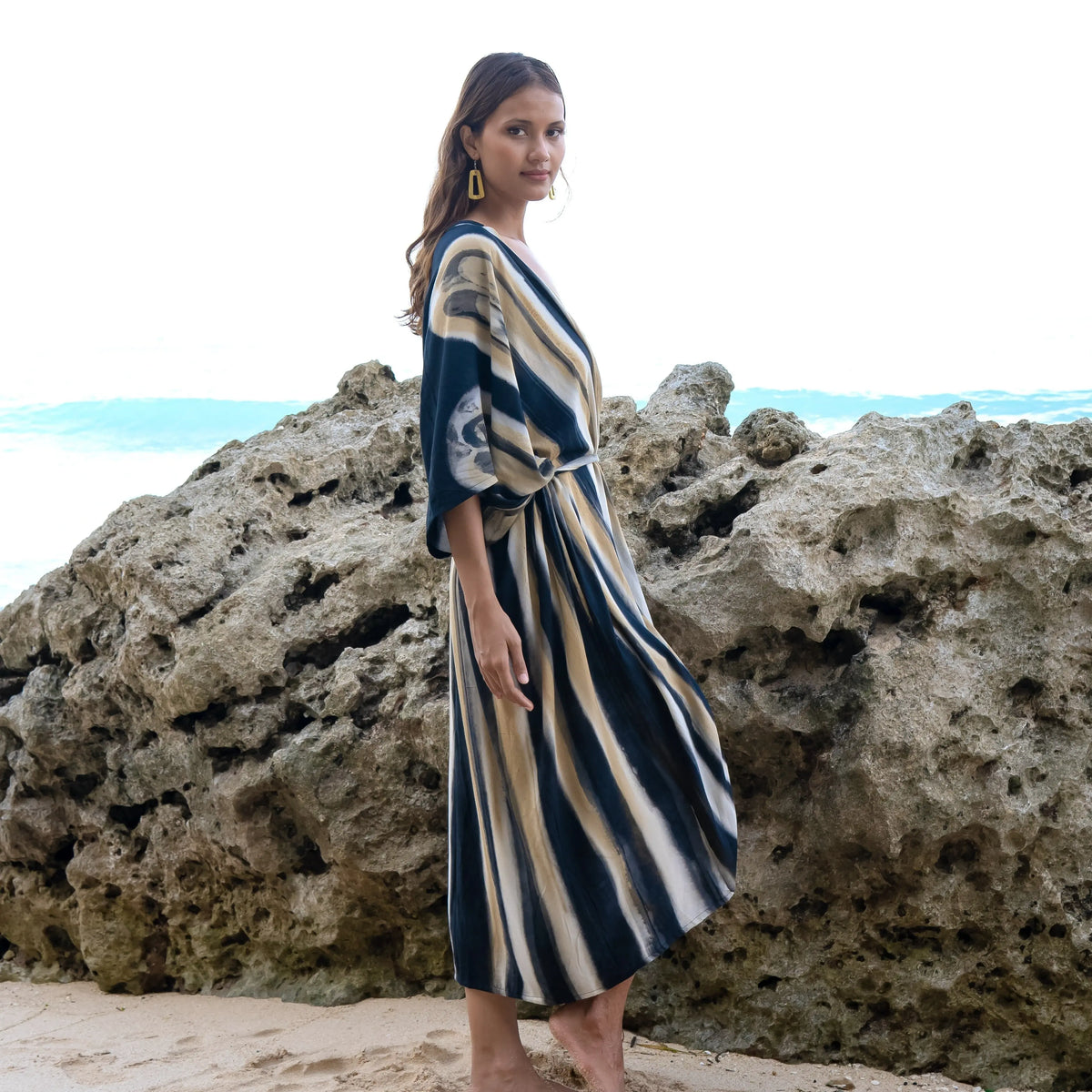 Suzie Blue Canada bold abstract tie dye kimono in grey and gold, stylish and versatile fashion piece with flowing fabric and unique pattern.
