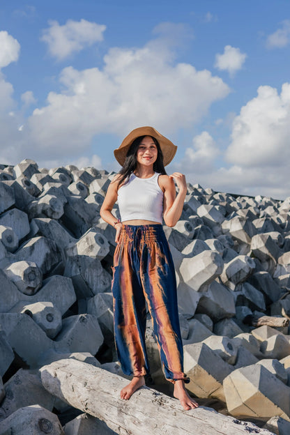 Navy gold tie-dye pants by Suzie Blue Canada featuring abstract Bali style, relaxed fit, and vibrant, artistic design.