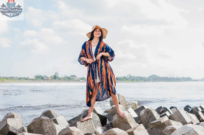 Navy and gold abstract kimono cover-up by Suzie Blue Canada featuring long flowy fabric and tie dye design.
