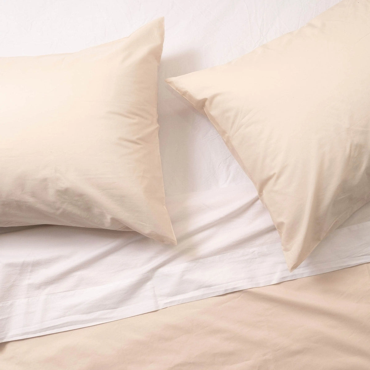 Organic cotton percale pillowcase set by Skylark+Owl Canada, soft and breathable pillowcases for luxurious sleep.