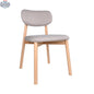Hygge Design House Alva dining chair with wooden legs and upholstered seat, modern and stylish for dining room decor.