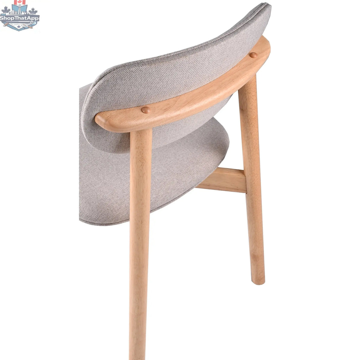 Hygge Design House Alva dining chair with wooden legs and upholstered seat, modern and stylish for contemporary dining rooms.