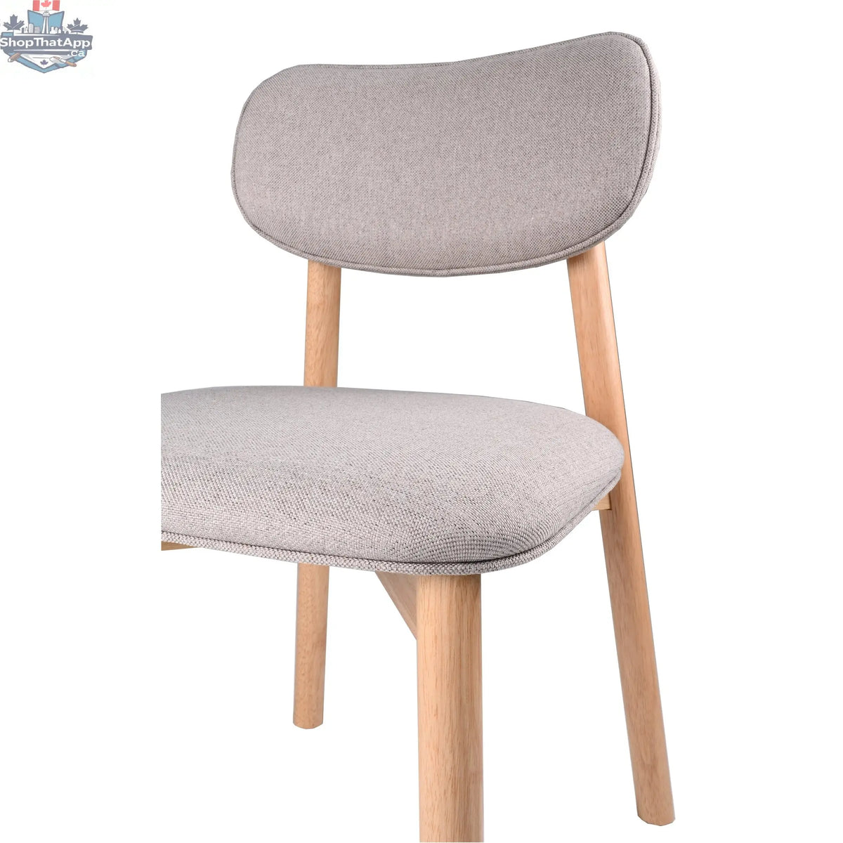 Hygge Design House Alva dining chair with wooden legs and upholstered seat, modern and stylish for dining room decor