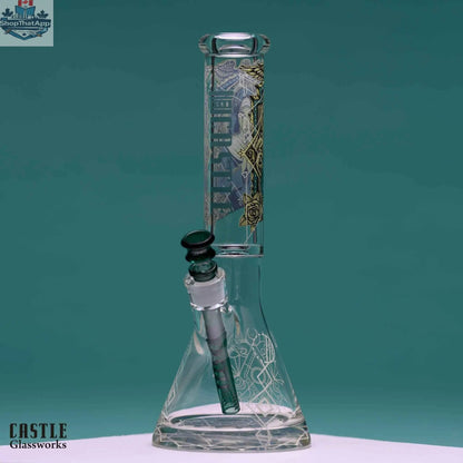 Castle Glassworks 14-inch beaker bong with occult graphic design, featuring 9mm thick glass for durability.