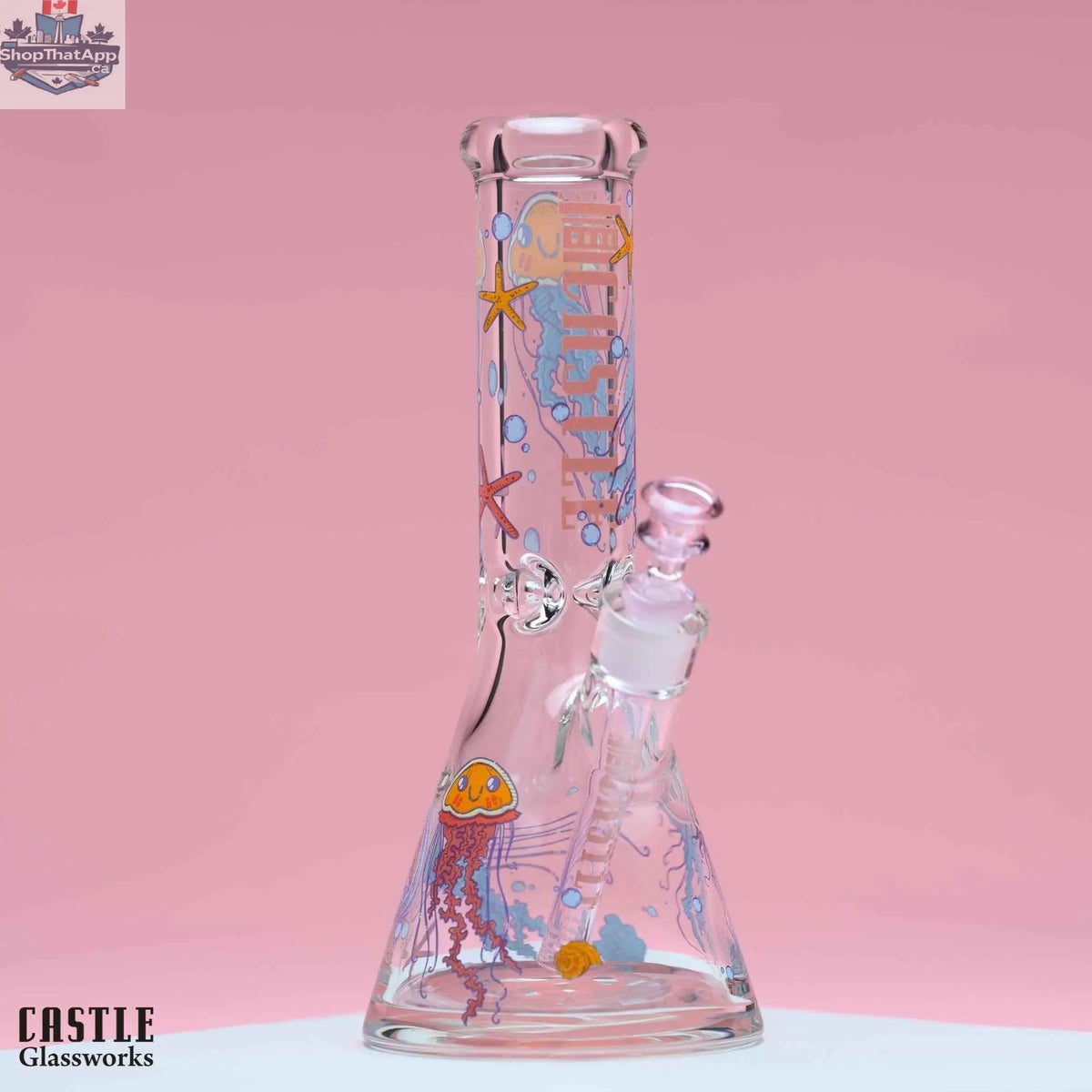 Castle Glassworks 12-inch beaker bong made of 9mm thick glass with a jellyfish design, featuring a sturdy beaker shape.