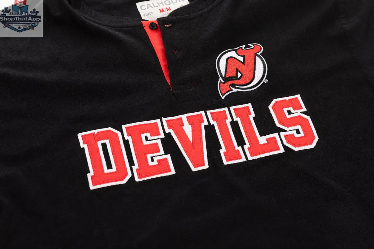 New Jersey Devils long sleeve henley shirt by Calhoun Surf N' Skate, featuring team logo and detailed fabric design.