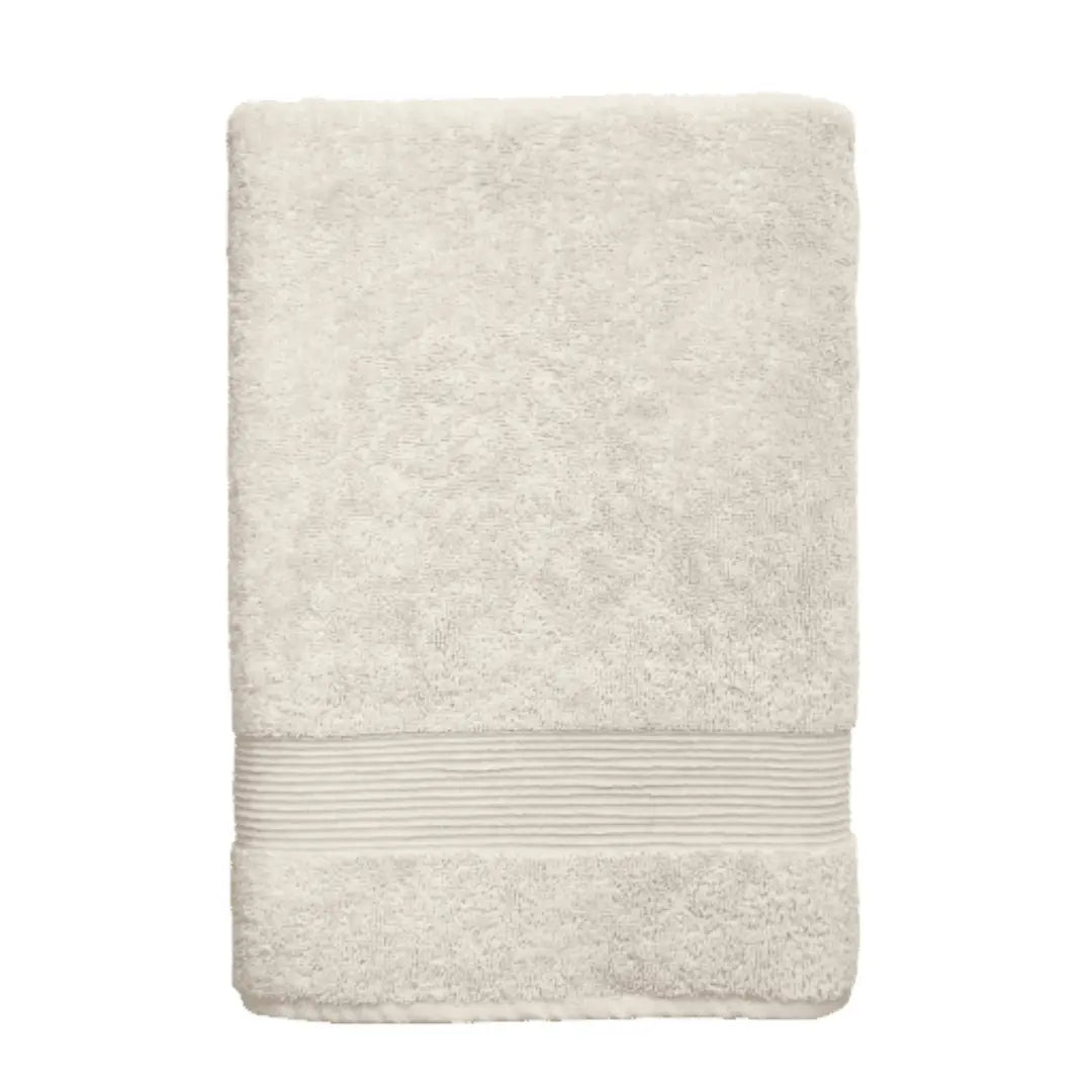 Essence Turkish bath towel by Skylark+Owl Canada in bone color, showcasing its luxurious, absorbent, and plush bath sheet design.