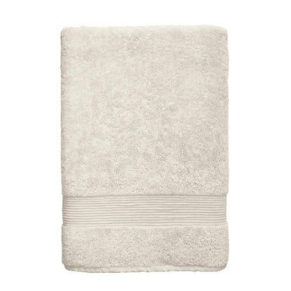 Essence Turkish bath towel by Skylark+Owl Canada in bone color, showcasing its luxurious, absorbent, and plush bath sheet design.
