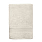 Essence Turkish bath towel by Skylark+Owl Canada in bone color, showcasing its luxurious, absorbent, and plush bath sheet design.