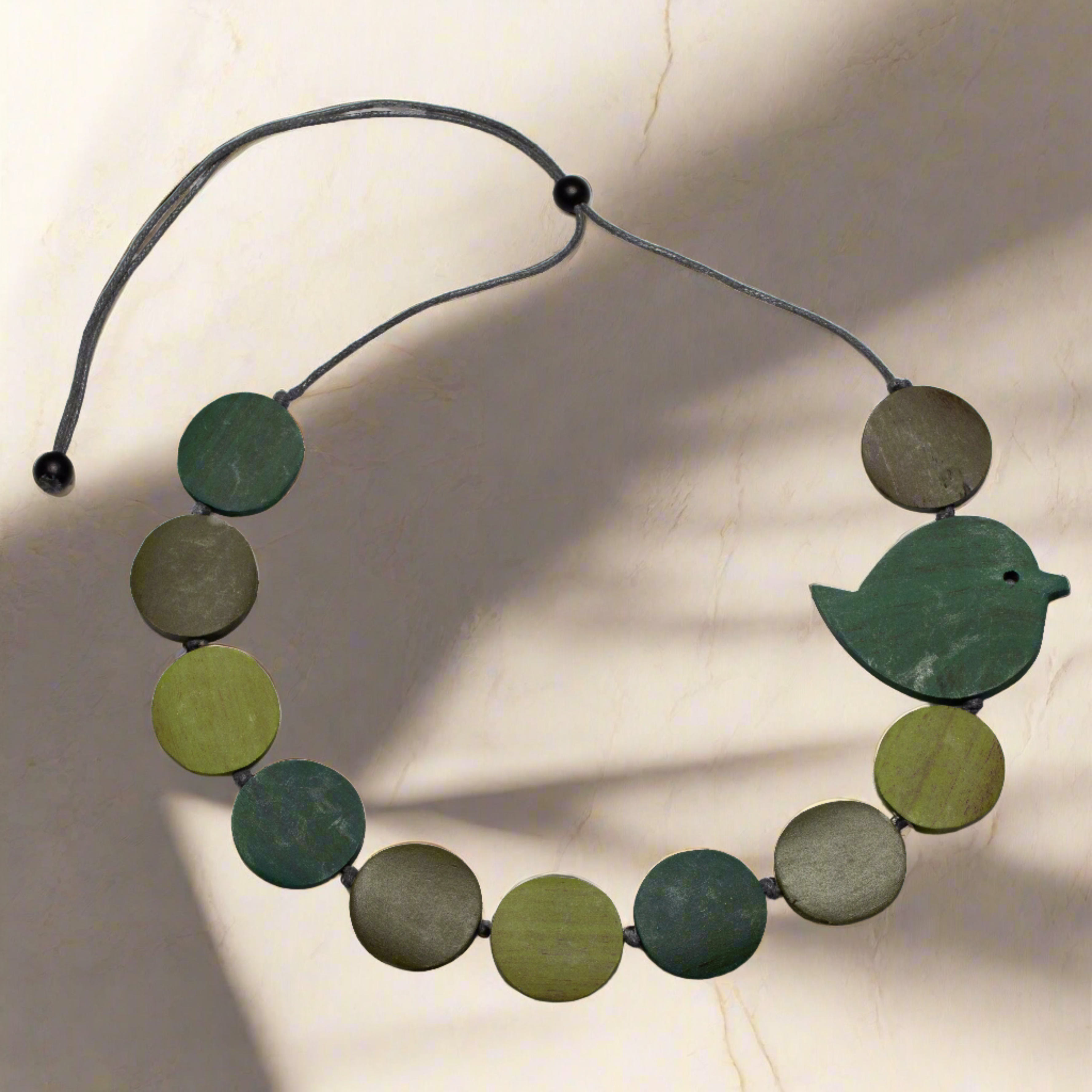 Fat Bird Necklace on Wooden Disc – Nature-Inspired Jewelry - Shopthatapp.ca