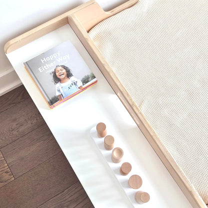 Sapiens Child Cherry Full Montessori floor bed with built-in shelves, featuring a wooden bed frame and accessible storage shelves.