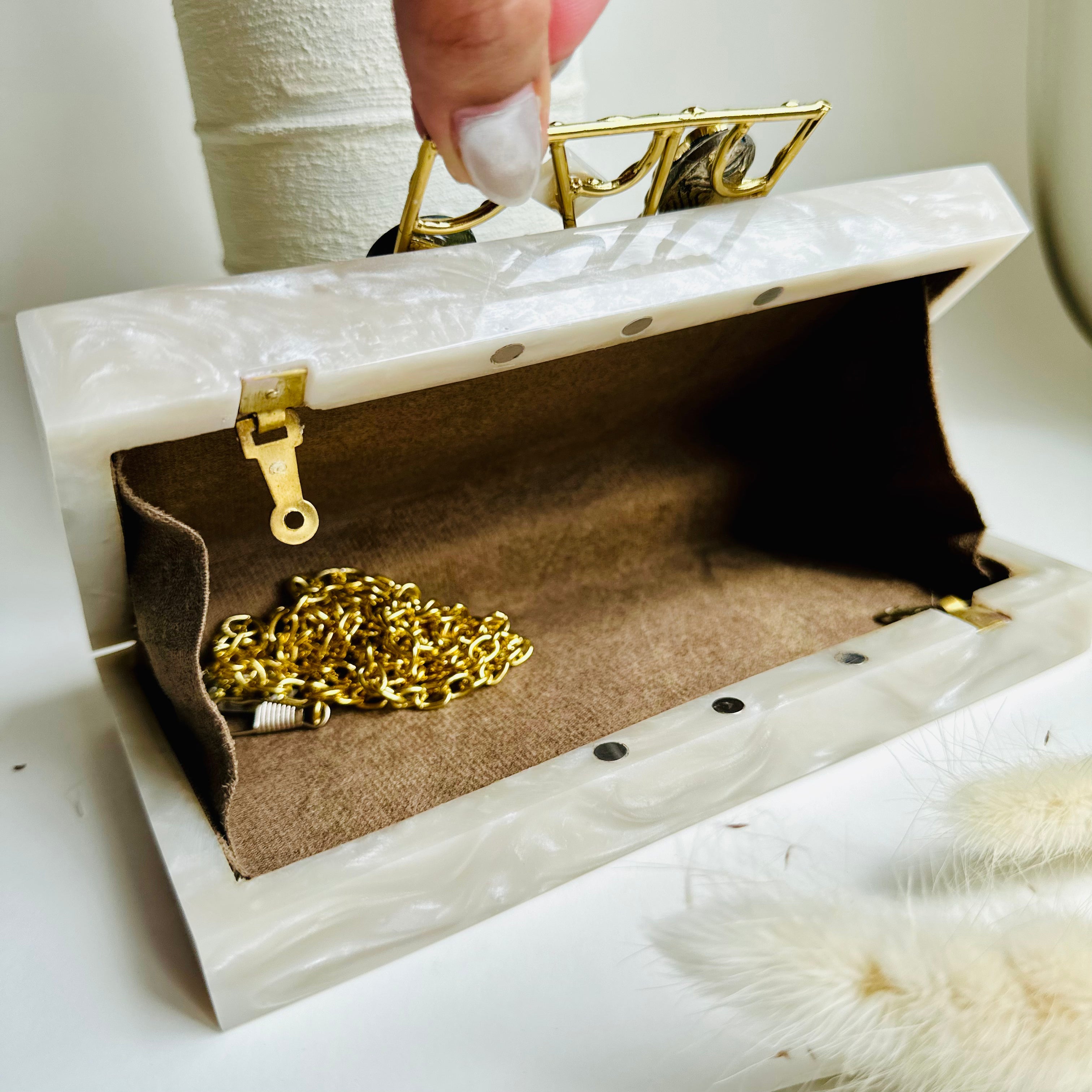 Elevate Your Style with Our Handcrafted Resin Clutch