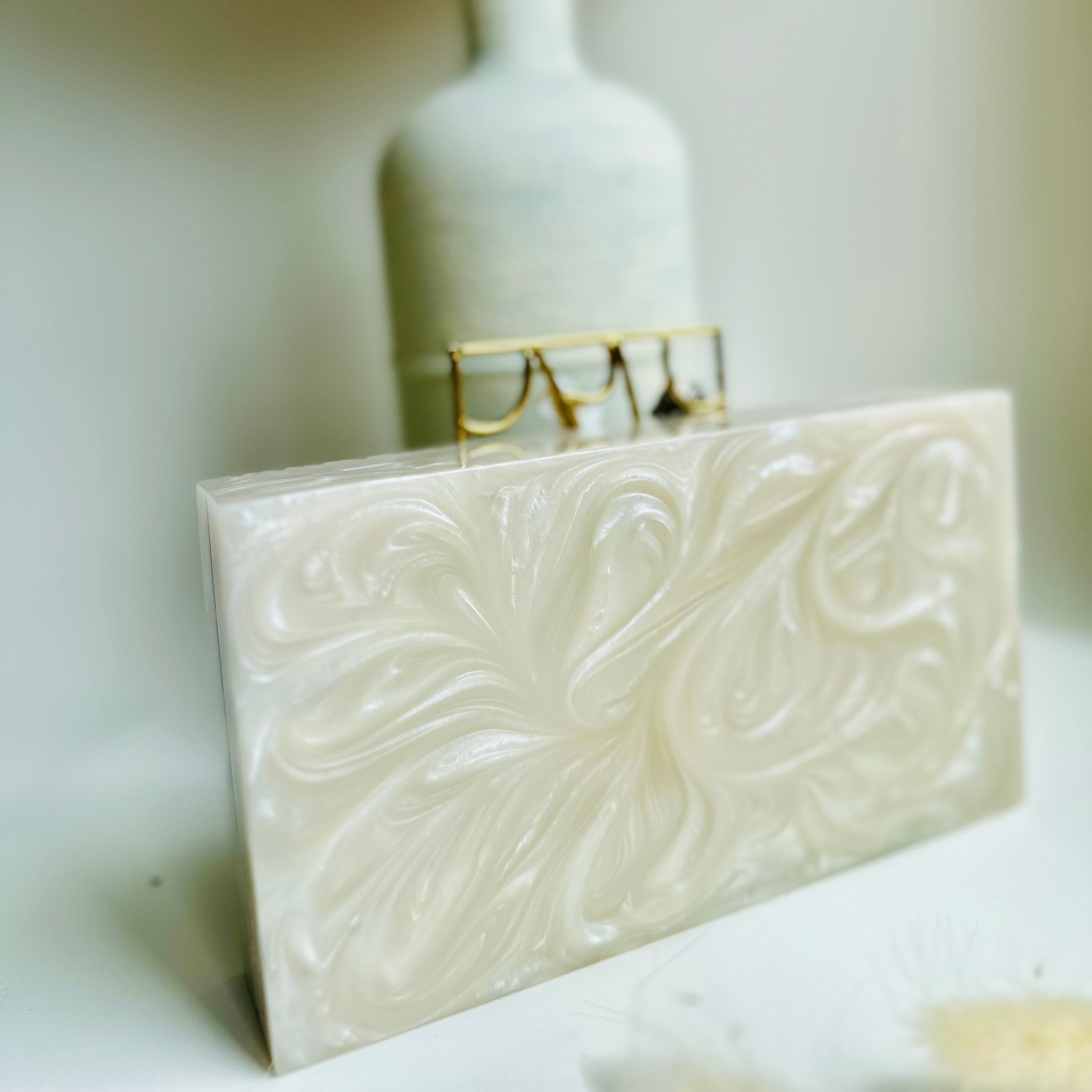 Elevate Your Style with Our Handcrafted Resin Clutch