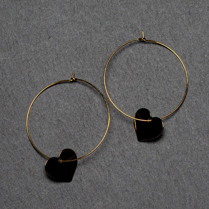 Gold plated heart on hoop earring by Suzie Blue Canada, stylish gold hoop with a heart-shaped charm for women.
