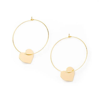 Gold plated heart on hoop earring from Suzie Blue Canada featuring a stylish gold heart design.