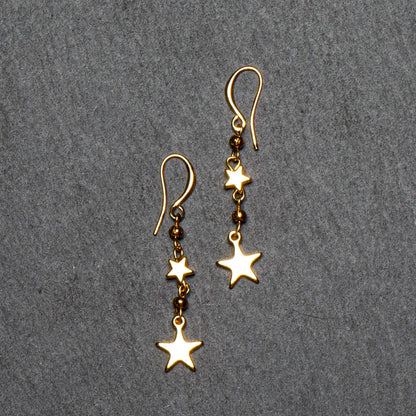Gold-plated star drop earrings by Suzie Blue Canada featuring a stylish and elegant design forAccessorizing.