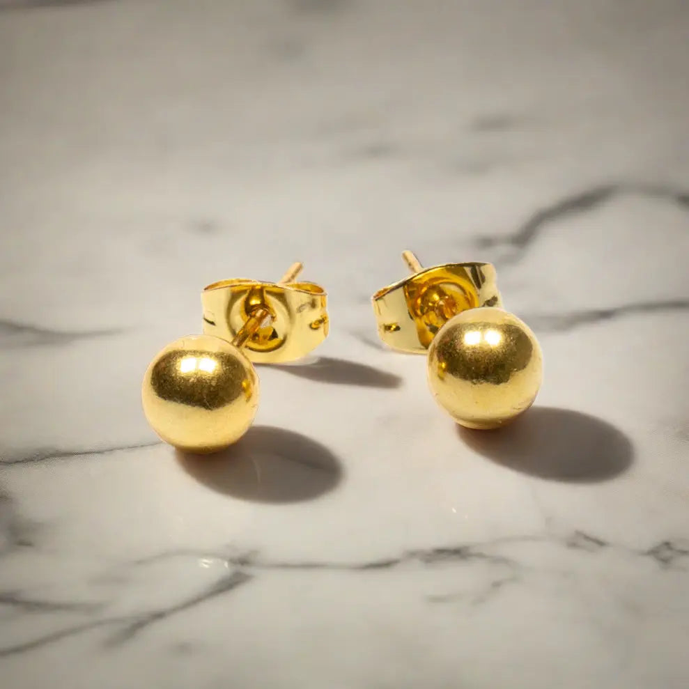 Gold plated ball stud earrings by Suzie Blue Canada featuring simple, elegant gold ear jewelry with round ball design.