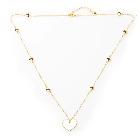 Gold-plated heart necklace with layered heart chain design by Suzie Blue Canada, featuring a delicate and stylish jewelry piece.