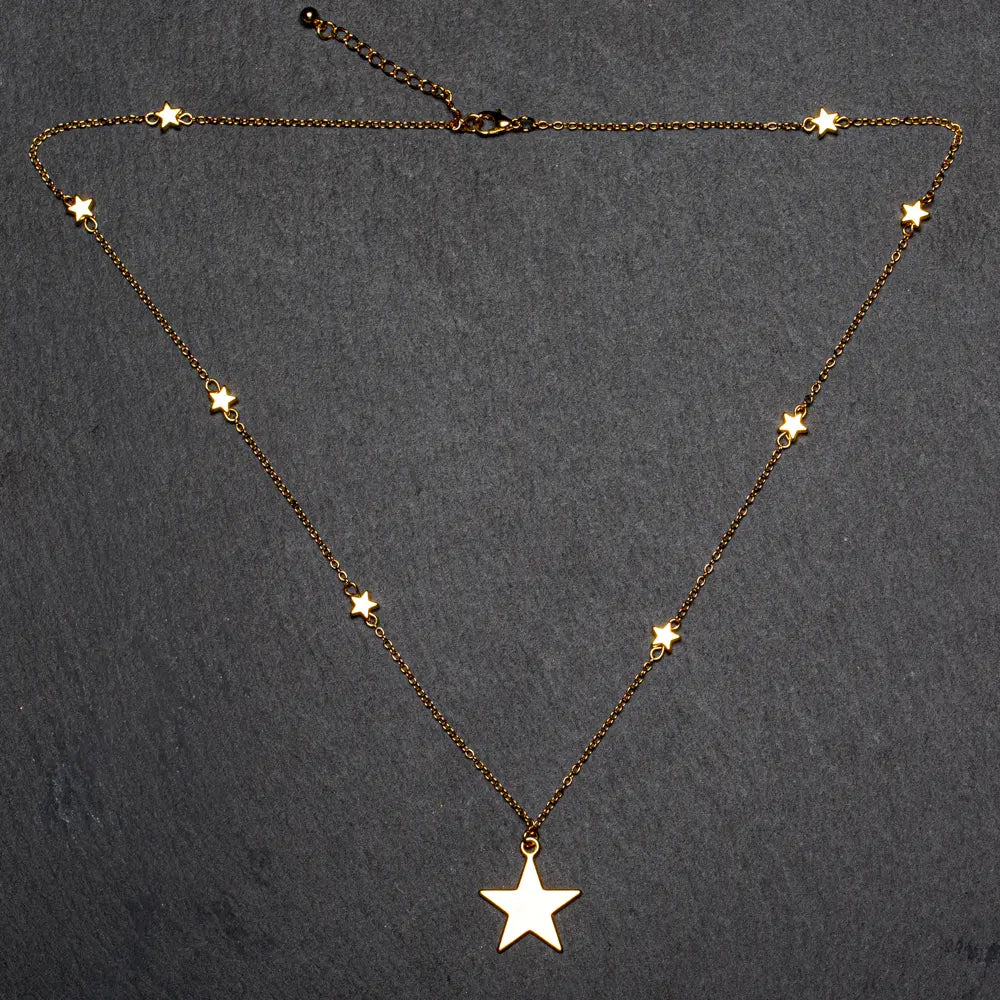 Gold plated star on star chain necklace for women by Suzie Blue Canada, showcasing elegant fashion jewelry design.