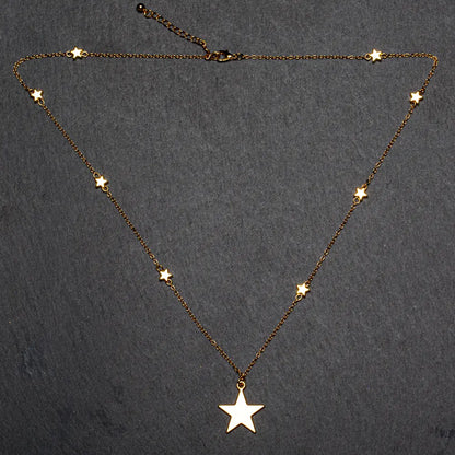 Gold plated star on star chain necklace for women by Suzie Blue Canada, showcasing elegant fashion jewelry design.